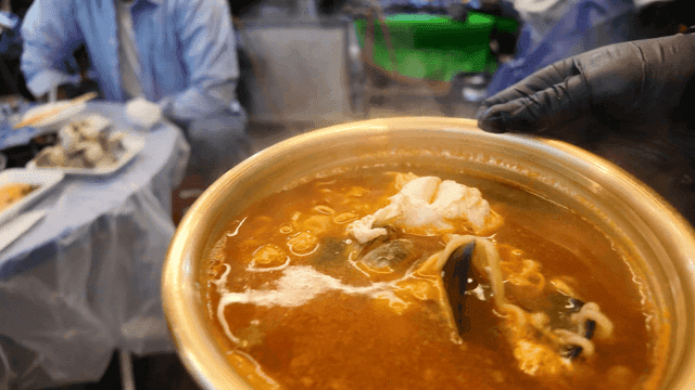 Bowl of spicy Korean ramen served at restaurant