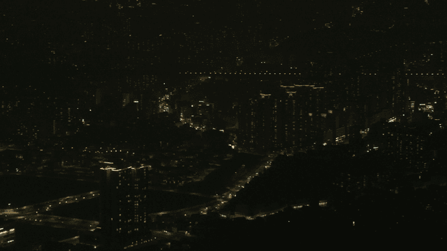 Night city landscape with twinkling lights