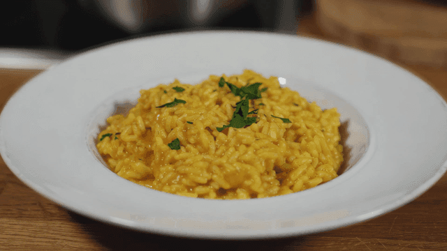 Creamy risotto garnished with herbs