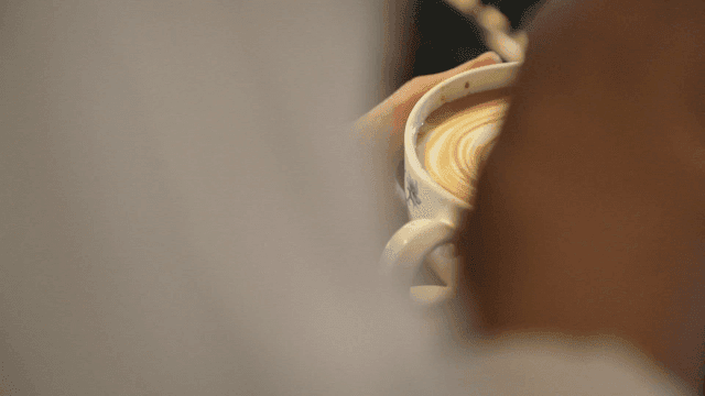 Latte art being created in a cup