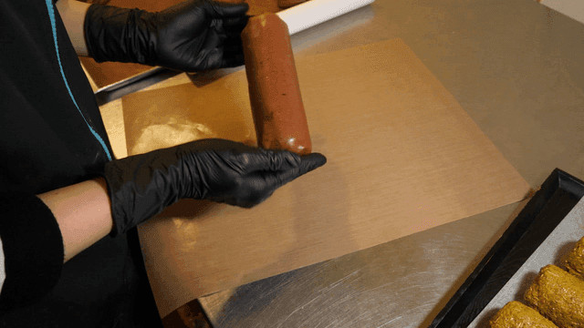 Long, chewy dough on baking sheet