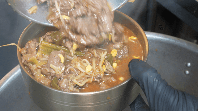 Bowl receiving Korean beef soup