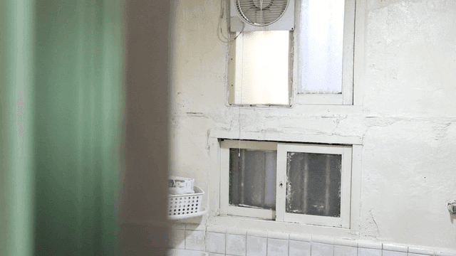Old bathroom with a small window