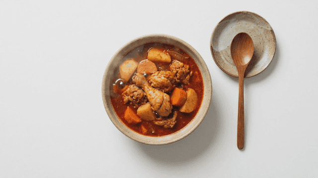 Spicy chicken stew with potatoes and carrots