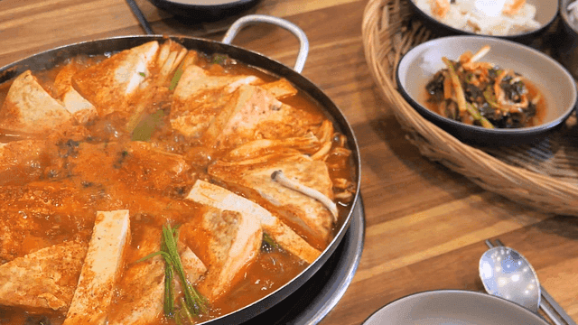 Kimchi stew boiling in a pot