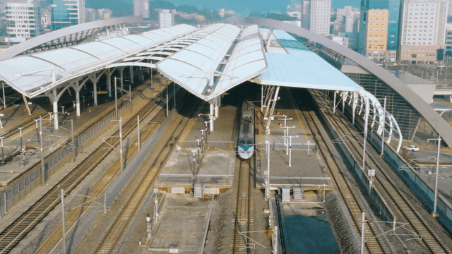 High-speed train arriving at station platform