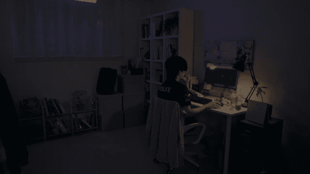 Person working late at a desk