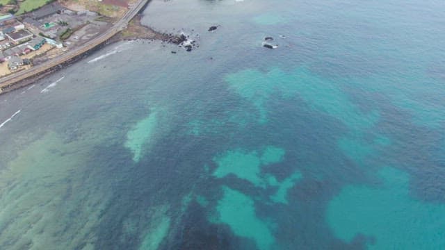 Coastal road and clear blue sea