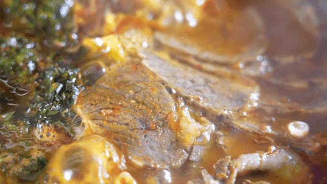 Spicy beef hot pot simmering with vegetables