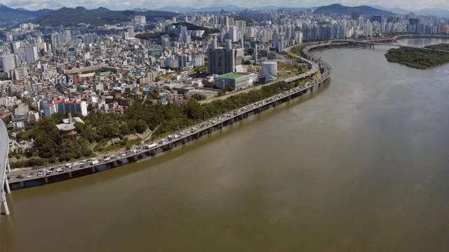 Bustling cityscape along a river