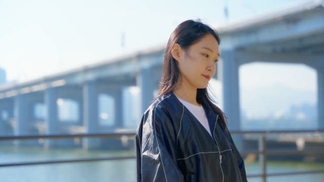 Woman checking smartwatch outdoors