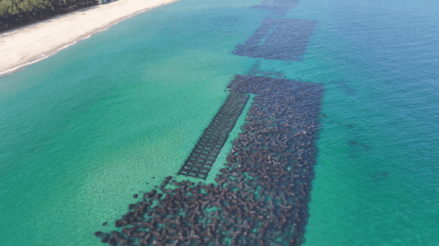 Clear ocean water with visible structures