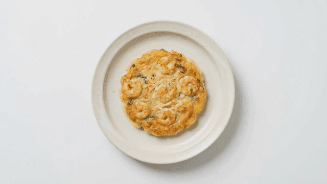 Shrimp pancake on a white plate