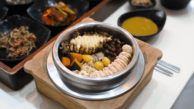 Stone pot with various ingredients