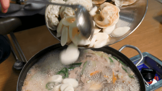 Dumpling hot pot with dumplings and rice cakes
