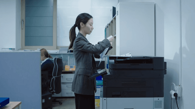 Office worker using a printer
