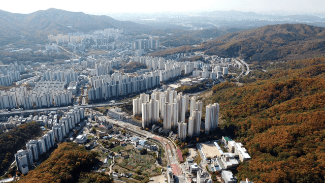 Panoramic view of city surrounded by mountains