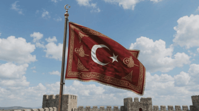 Ottoman Empire flag fluttering at historic fortress