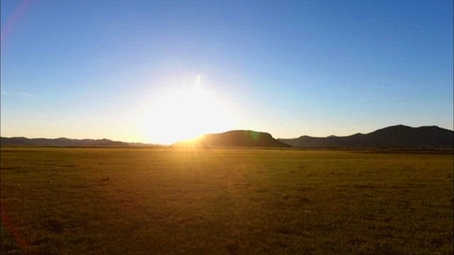 Sunset sunlight illuminating the vast plains