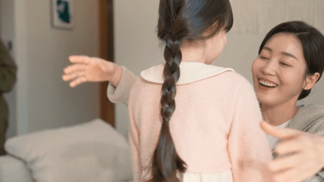 Mother and daughter sharing a joyful moment