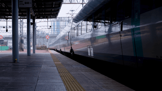 High-speed train arriving at station platform