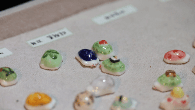 Colorful ceramic art pieces on display