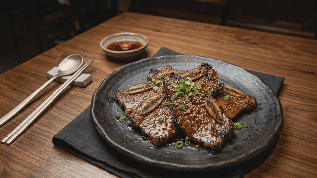 Marinated grilled short ribs sprinkled with sesame seeds