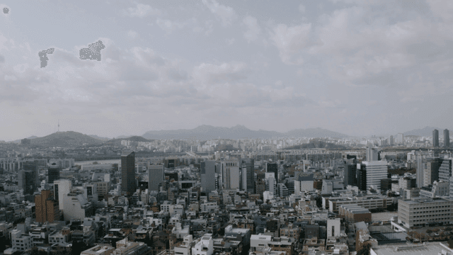 Cityscape under cloudy sky