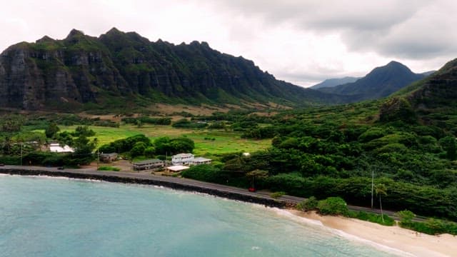 Aerial View of Coastal Village and Beach