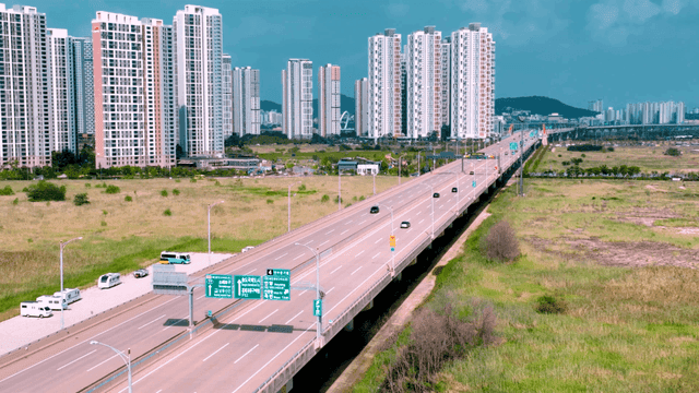 Highway with skyscrapers in the background