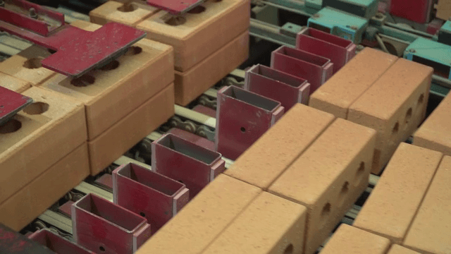 Bricks being processed on a conveyor belt