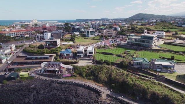 Coastal town with ocean and buildings