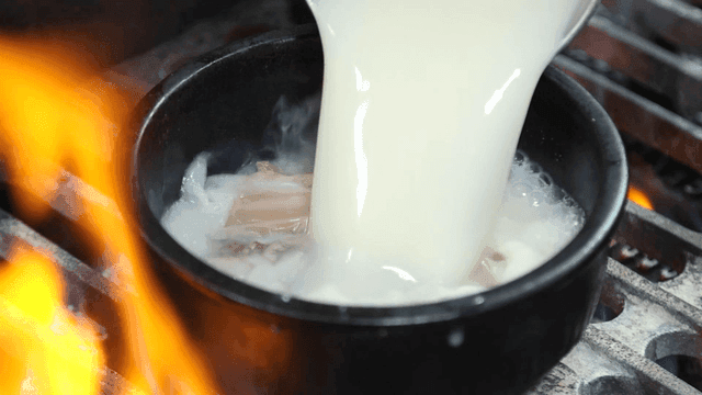 Beef head soup boiling hot over stove