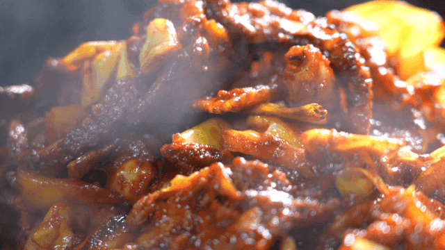 Spicy stir-fried octopus cooking