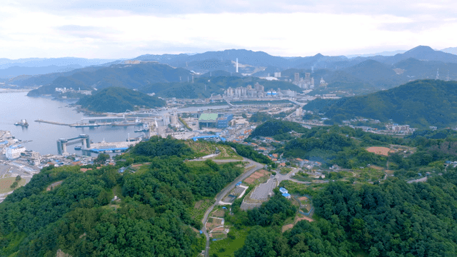 Coastal village surrounded by mountains