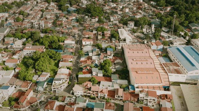 Aerial view of residential area in Philippines with green spaces