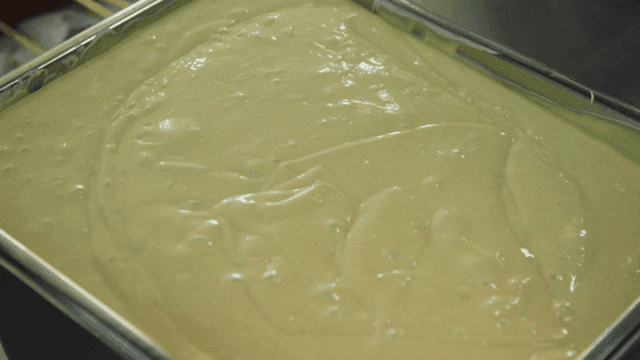 Baking pan filled with dough
