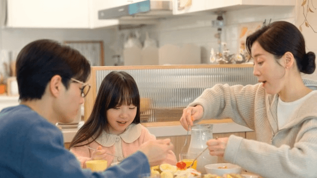 Family enjoying breakfast together