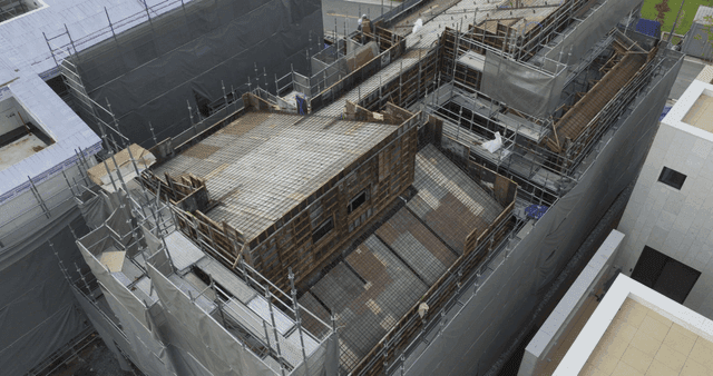 Construction site with scaffolding and workers