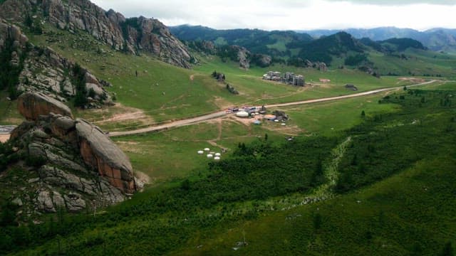 Vast landscape with mountains and fields