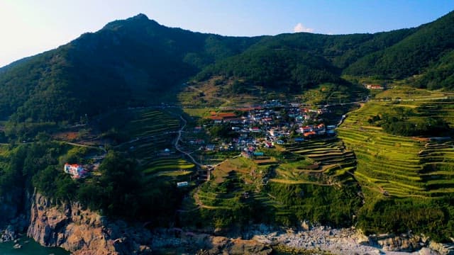 Scenic Terraced Village with Sunlight