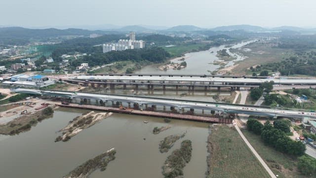 Aerial View of Bridge Construction over River