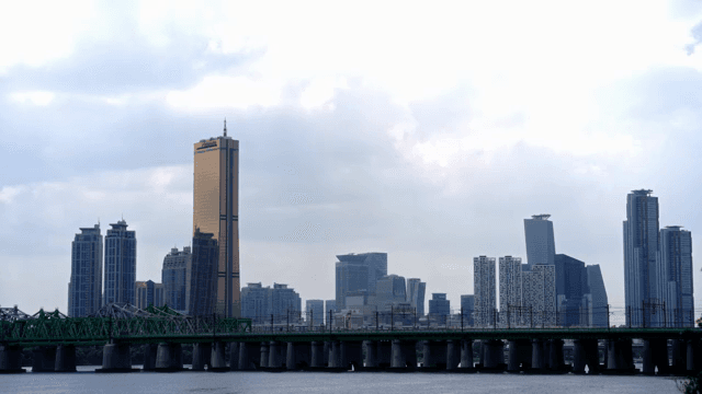 City skyline with a bridge and train