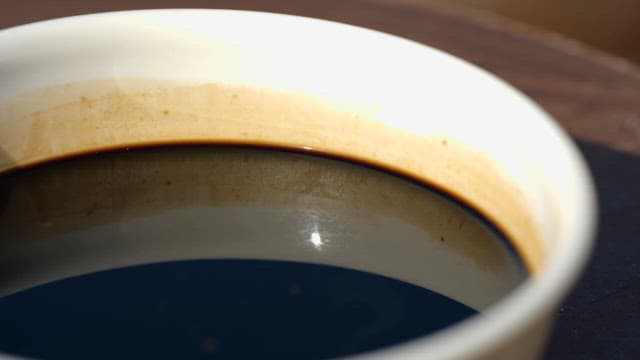 Brown Soy Sauce in an White Small Dish for Soy Sauce