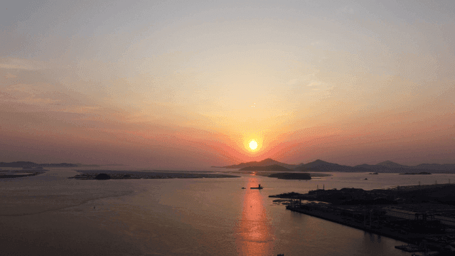Sunset over coastal dock scenery