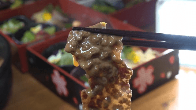 Sukiyaki beef dipped in raw egg