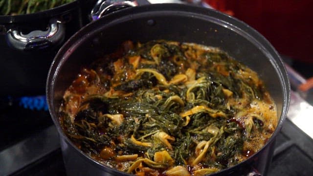 Napa cabbage boiling in a pot