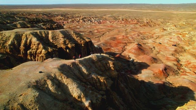 Explorers Admiring Majestic Desert Canyons