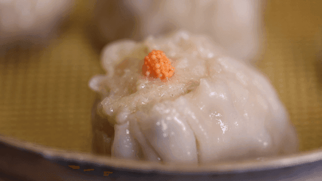 Steamed dim sum topped with fish roe