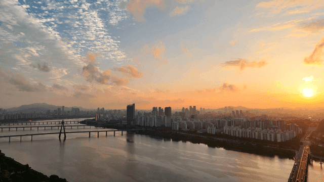 City skyline of sunrise with river
